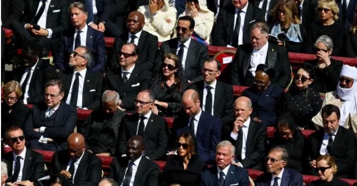 Prince William (centre) seated next to Scholz (right)/Screengrab