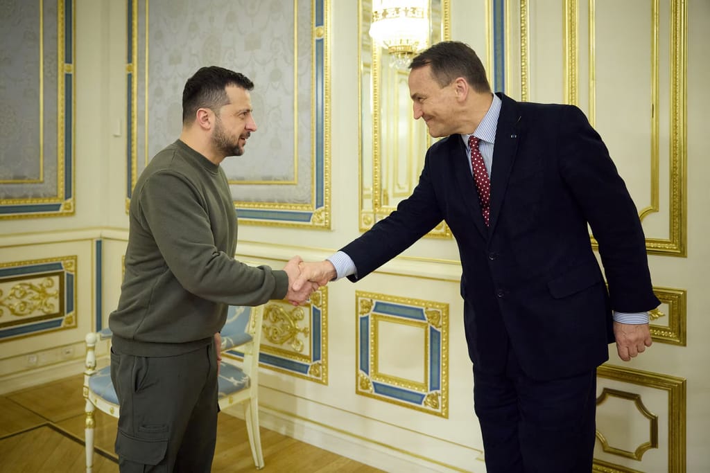 Poland, a major donor to Ukraine, has provided about half the Starlink terminals now being used in the country. President Volodymyr Zelenskiy, left, welcomed Polish Foreign Minister Radoslaw Sikorski to a 2023 meeting in Kyiv. Photo via Ukrainian Presidential Press Service
