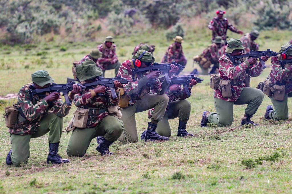 Kenyan police officers during an operation taking aim.