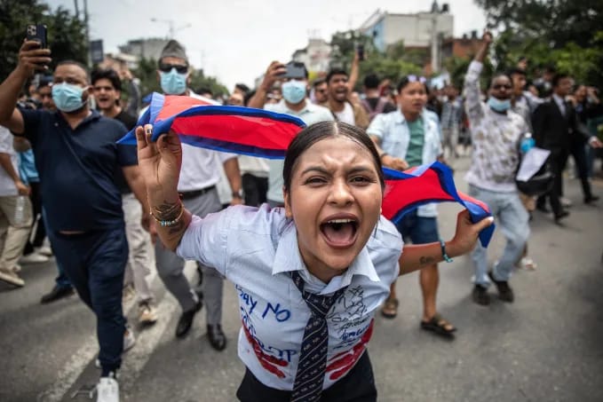 A demonstrator shouts slogans during a protest outside the Parliament in Kathmandu on September 8, 2025, condemning social media prohibitions and corruption by the government. Prabin Ranabhat/AFP/Getty Images