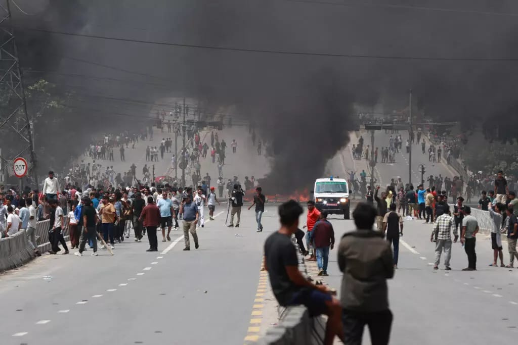 A burning baricade on a road in Kathmandu on September 9