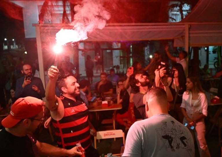 Brazilians celebrate the Supreme Court decision against former president Jair Bolsonaro / AFP