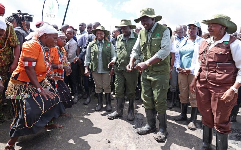 President William Ruto joins a group of dancers for a jig during the National Tree Planting Day in Kiu, Makueni, County on Monday, November 13, 2023. PHOTO/PCS