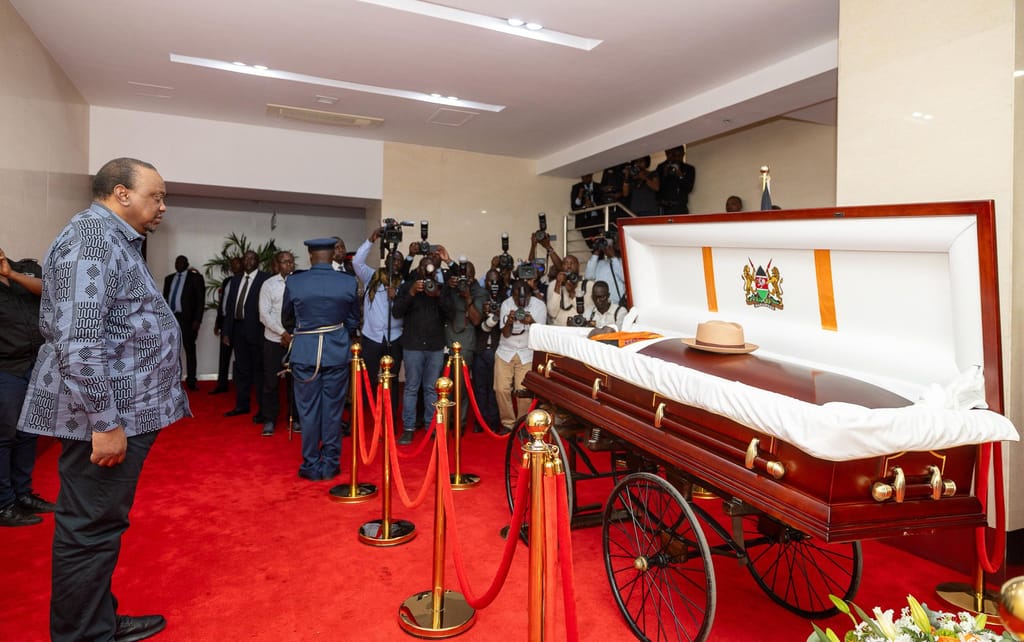 Former President Uhuru Kenyatta viewing Raila Odinga's body at Kasarani Stadium