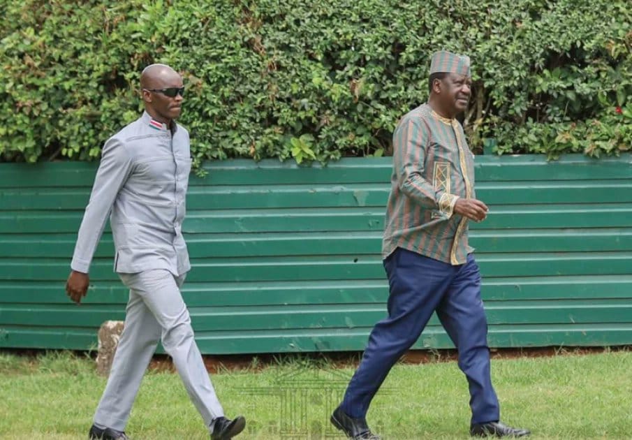 The late Prime Minister Raila Odinga and his bodyguard Maurice Ogeta.PHOTO/@RailaOdinga/X