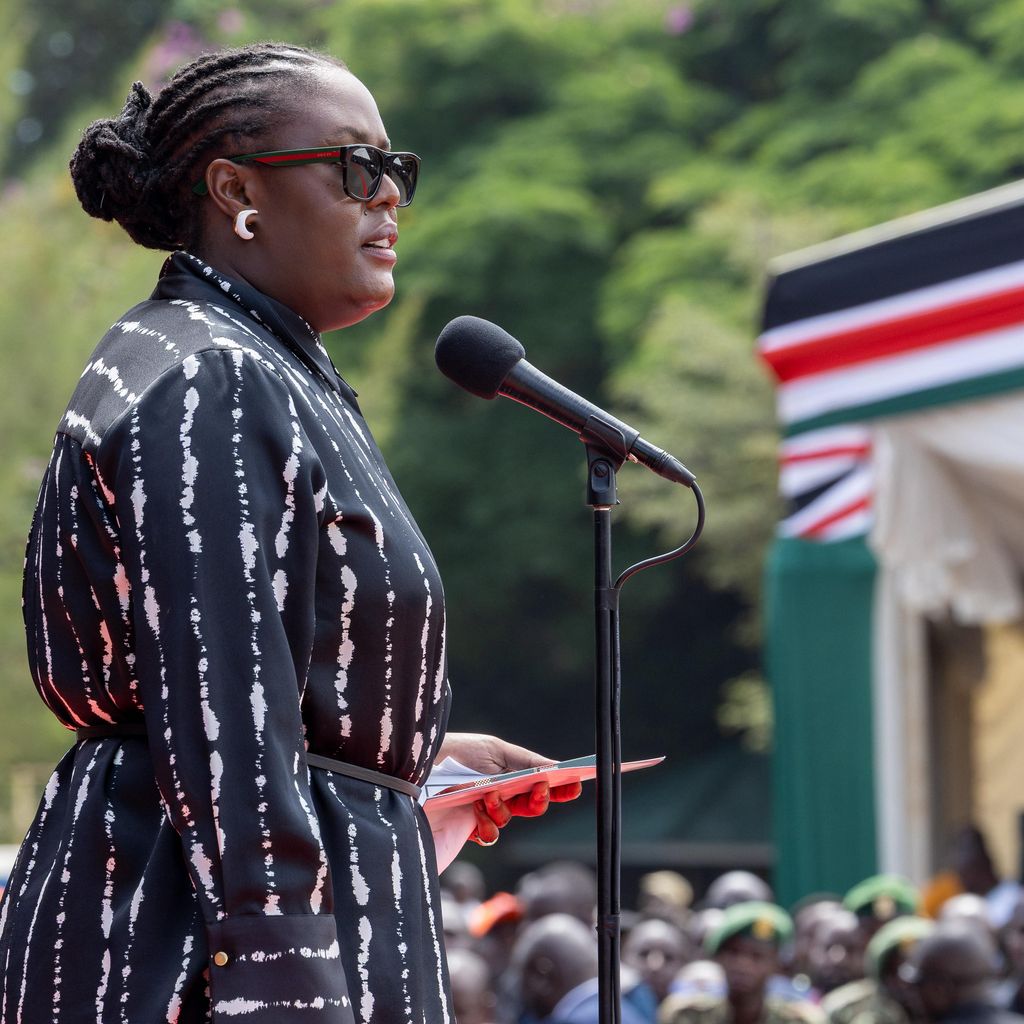 Winnie Odinga stands as she delivers last speech during father’s funeral in Bondo.
