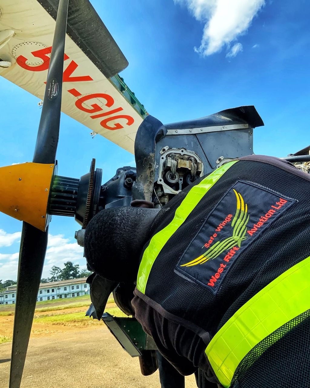 West Rift Aviation engineer checks on one of the planes.
