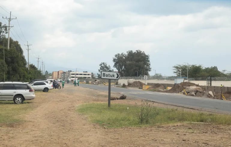 A British Army Training Unit Kenya (BATUK) signage stands next to the road, as Kenya’s parliament accuse British soldiers of decades of sexual abuse, killings, human rights violations and environmental destruction while training in the country, in Nanyuki, Laikipia County, Kenya, December 4, 2025 [Monicah Mwangi/Reuters]