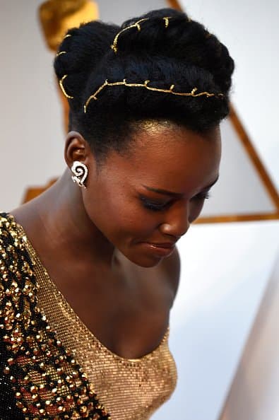 Oscars 2018: Lupita Stuns The Red Carpet In Versace Gown, Rwandese Hairstyle And Why Kenyan Designers Lost