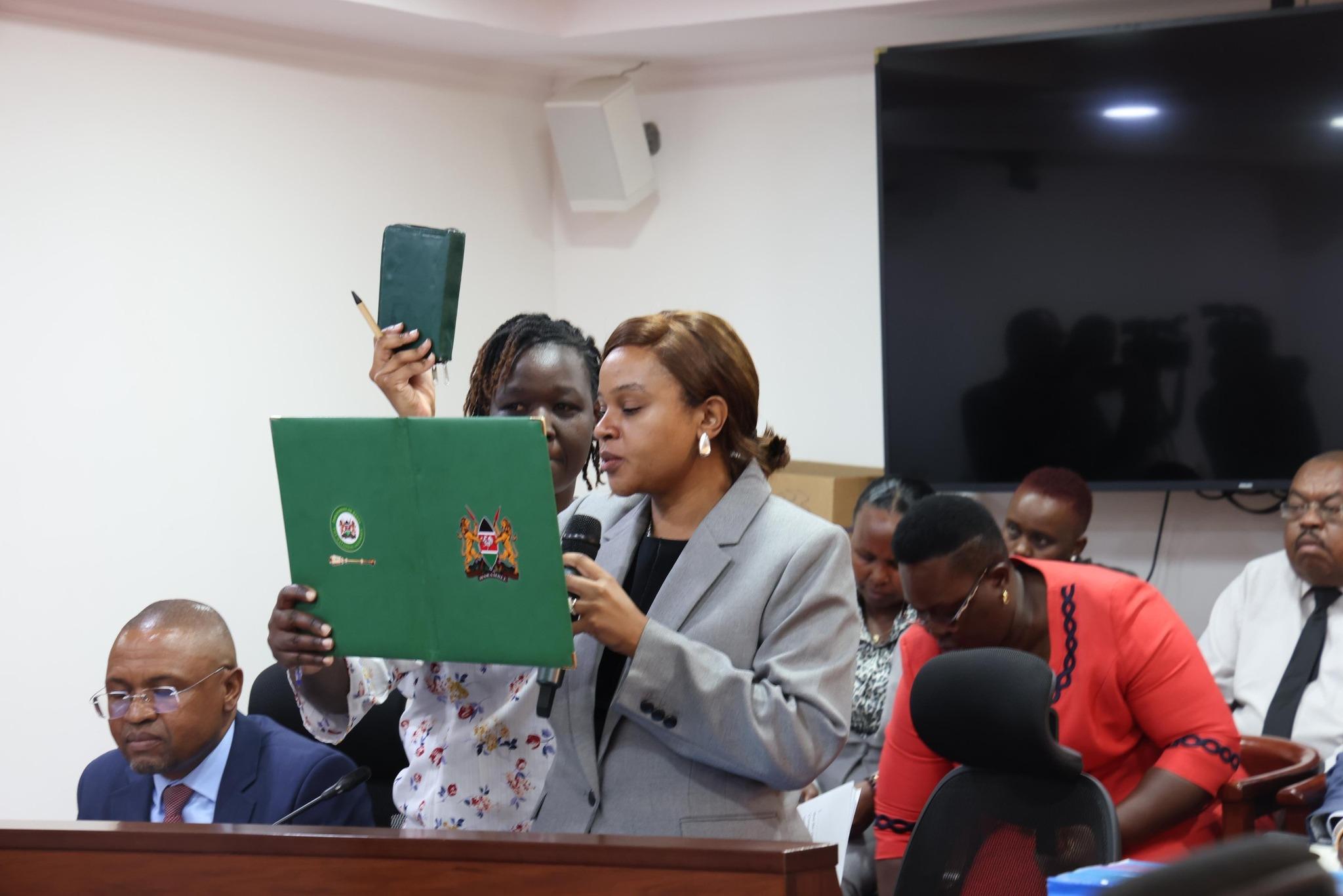 SHA CEO Dr Mercy Mwangangi takes oath before being questioned by MPs over unsupported board payments and irregular legal fees, October 22, 2025. /PARLIAMENT
